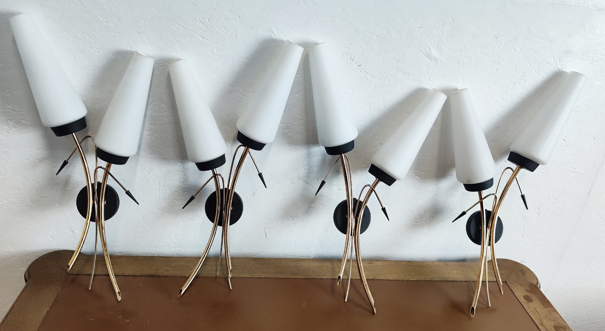 A set of 4 Maison Arlus Wall Lights